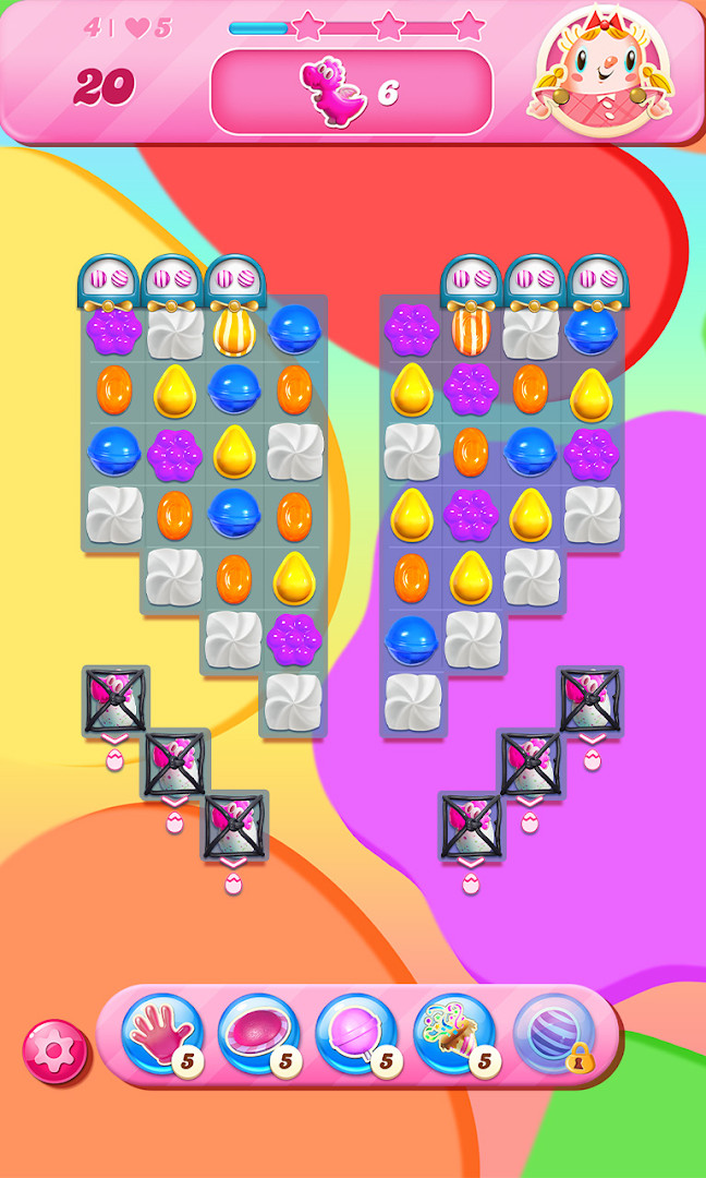 Candy Crush Saga booster selection screen with lollipop hammer.